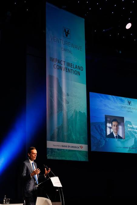 Speaker addressing the Venturewave Impact Ireland Convention, supported by Bank of America